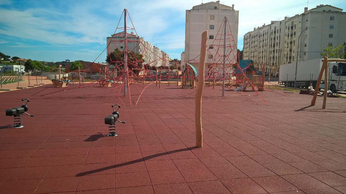Shock-absorbing rubber flooring in play areas
